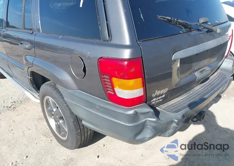 2004 Jeep Grand Cherokee Laredo z USA, uszkodzony, nr VIN 1J4GW48S04C218898